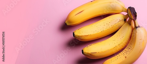 Bright yellow bananas on a ...