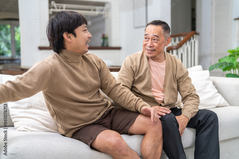 Obraz premium Portrait of enjoy happy love asian family senior mature father and young man son smiling play laughing and having fun together at home, care, elderly, insurance.happy family and Father Day concept