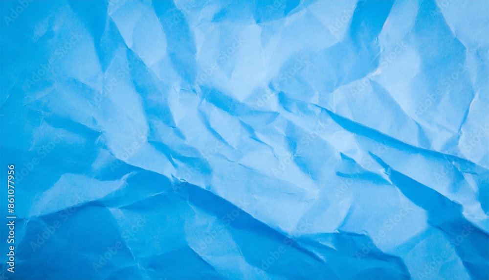 Obraz premium crumpled blue paper texture background
