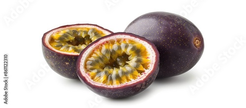 Isolated passionfruits. One and a half passion fruits (maracuya) isolated on white background with clipping path. Copy space image. Place for adding text and design