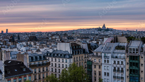 France, Ile-de-France, Paris, Old town apartments seen from Centre Pompidou at dusk photo