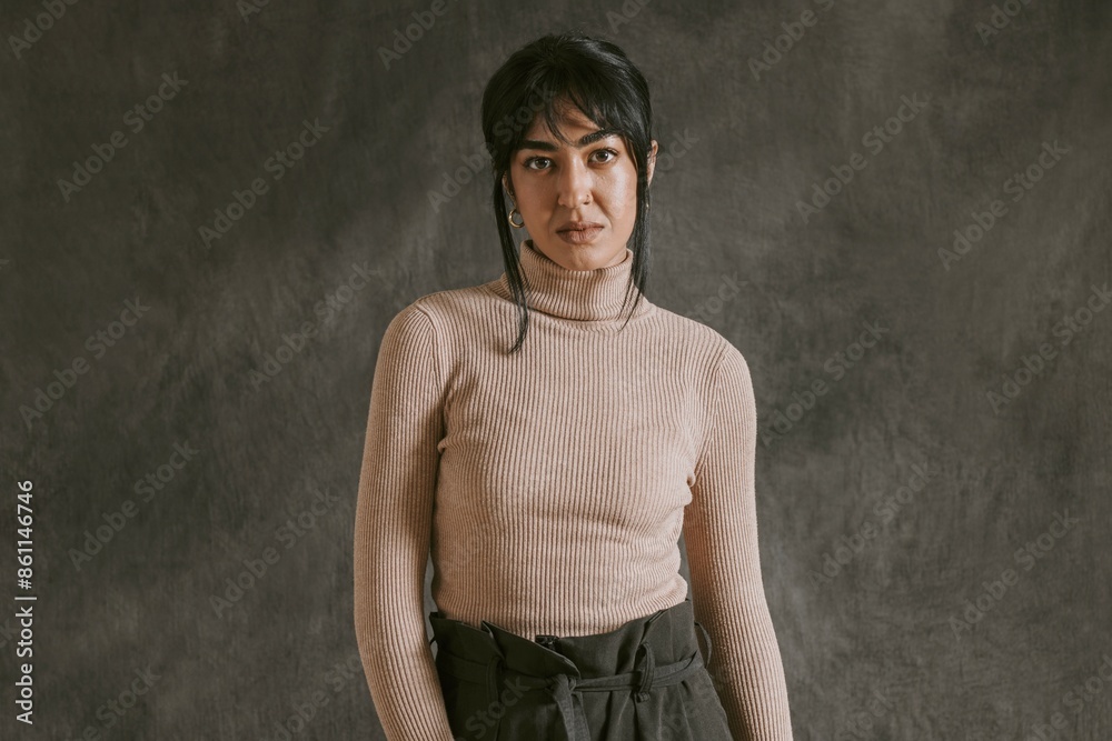 Woman wearing autumn beige turtleneck sweater Woman wearing autumn beige turtleneck sweater