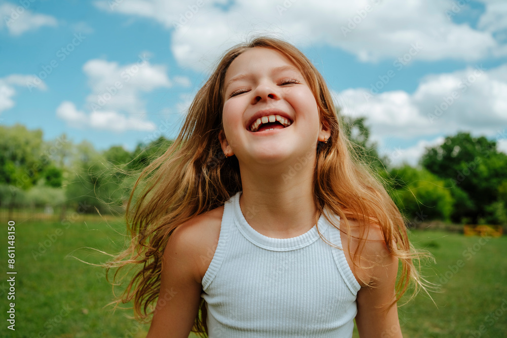 Cheerful blond girl laughing in farm Cheerful blond girl laughing in farm