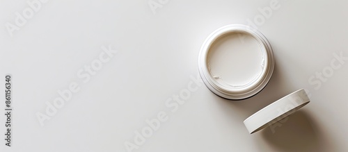 Top view of blank cosmetics jar isolated on white. Copy space image. Place for adding text or design