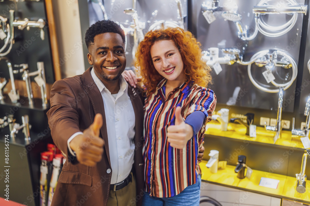 Obraz premium Portrait of young couple who owns small business bath store. Man and woman work in partnership.
