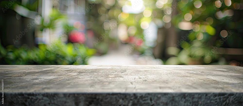 Cement table top and blurred background. Copy space image. Place for adding text and design Cement table top and blurred background. Copy space image. Place for adding text and design