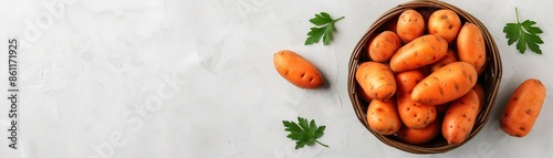 Stylish sweet potatoes frame featuring modern arrangements of sweet potatoes in a rustic basket, ideal for a sleek and countryside theme on a white background photo