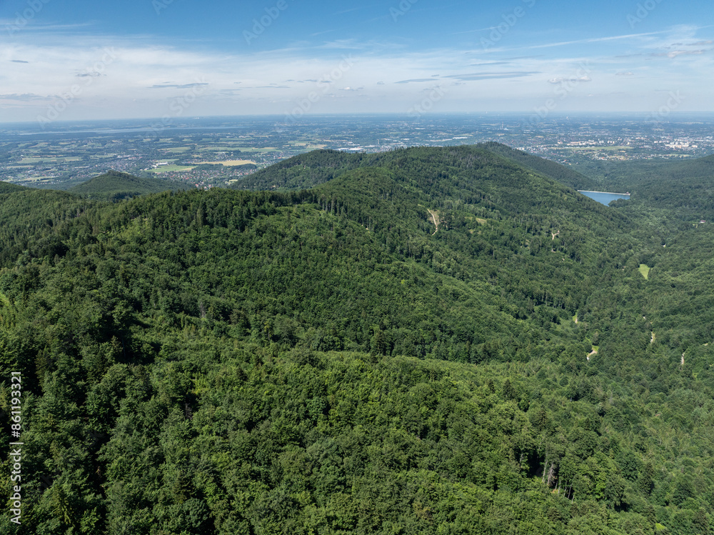 Drone fly above green mountains in summer. Polish green mountains and hills aerial drone photo. Drone view in Beskid mountains, Blatnia. Summer green forest on Blatnia. Beskid mountains in Jaworze.
