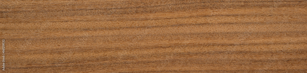 Naklejka premium Afrormosia veneer with rich, straight grain and deep golden-brown tones