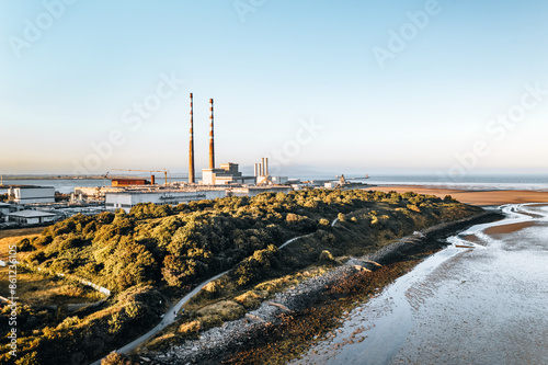 Aerial View of Poolbeg Power Station in Dublin with Scenic Coastal Landscape and Expansive Industrial Complex