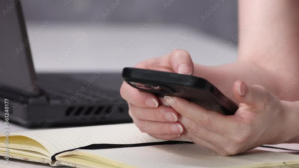 female hands pressing with finger, reading on social networks, typing text or shopping online. Mobile phone in the hands of a girl
female hands pressing with finger, reading on social networks, typing text or shopping online. Mobile phone in the hands of a girl