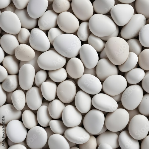 White gravel stones, close-up view of a pile of small, smooth, rounded pebbles