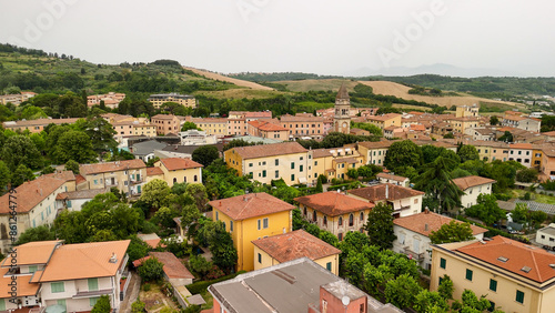 Aerial view of the historic center of Casciana Terme, Pisa, olive trees and vineyards in the background photo