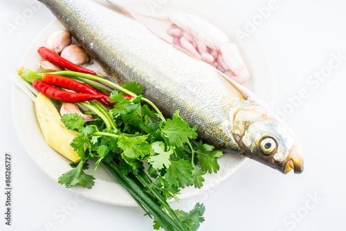 Fresh white fish and spices photo