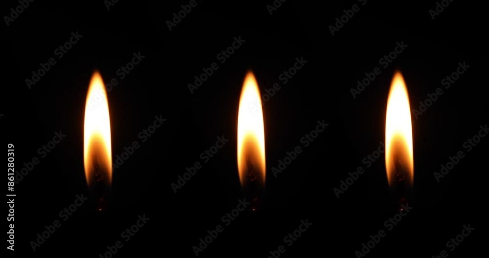 Closeup flame burning in candle isolated on dark background. Closeup flame burning in candle isolated on dark background.