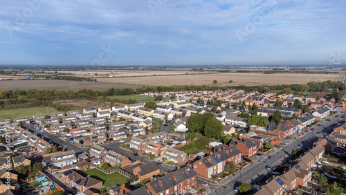 Aerial drone photo of the village of Moorends in the north-east of the Metropolitan Borough of Doncaster, South Yorkshire showing residential housing estates.