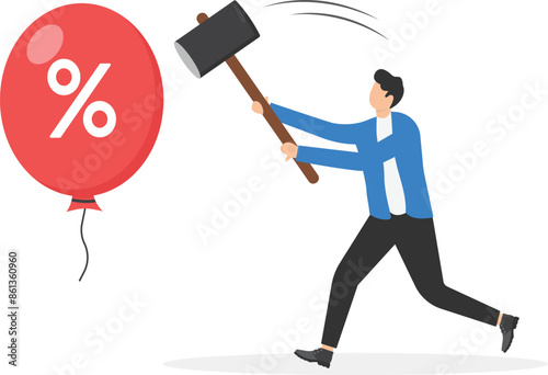 Businessman hitting balloon with hammer. Beat inflation. High interest rates on loans. Federal Reserve seeks to control inflation by influencing interest rates. Economic risk or investment bubble.

