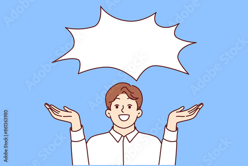 Happy business man offering good idea or communicating profitable offer, standing under empty dialogue cloud. Laughing businessman happily spreads arms to sides, showing copy space for your idea