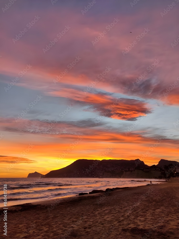 Amazing Beautiful Sunset on the Beach by the Sea with a Gorgeous Sky In Spain Calpe Mediterranean Sea Amazing Beautiful Sunset on the Beach by the Sea with a Gorgeous Sky In Spain Calpe Mediterranean Sea