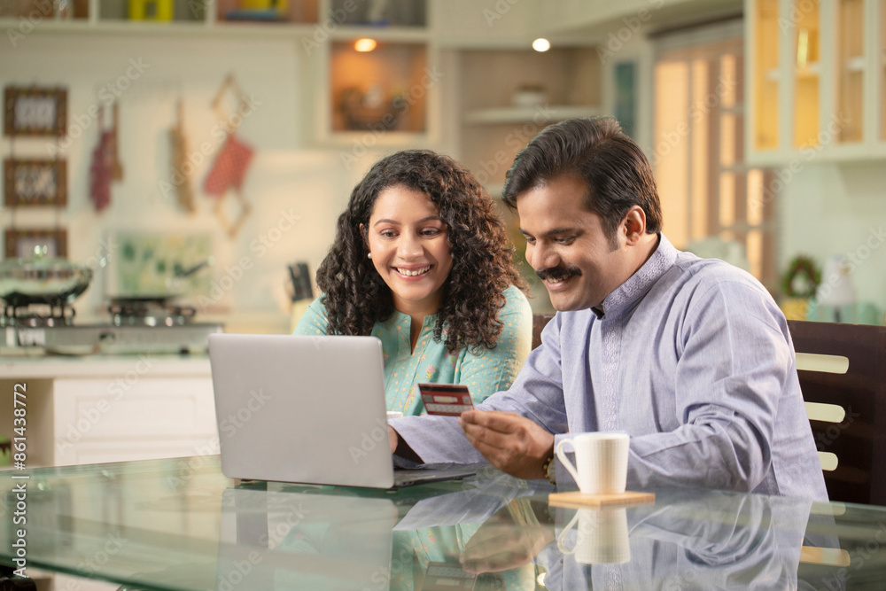 Hubby And Wifey Shopping Online Over Laptop At Home Hubby And Wifey Shopping Online Over Laptop At Home