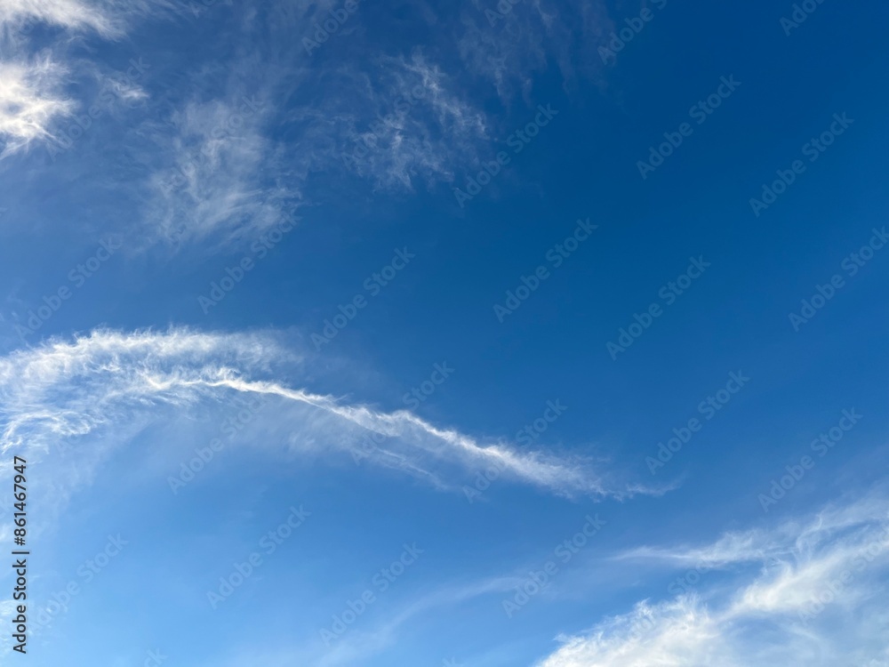 Natural heavens background, white clouds on the blue sky, cloudscape background Natural heavens background, white clouds on the blue sky, cloudscape background