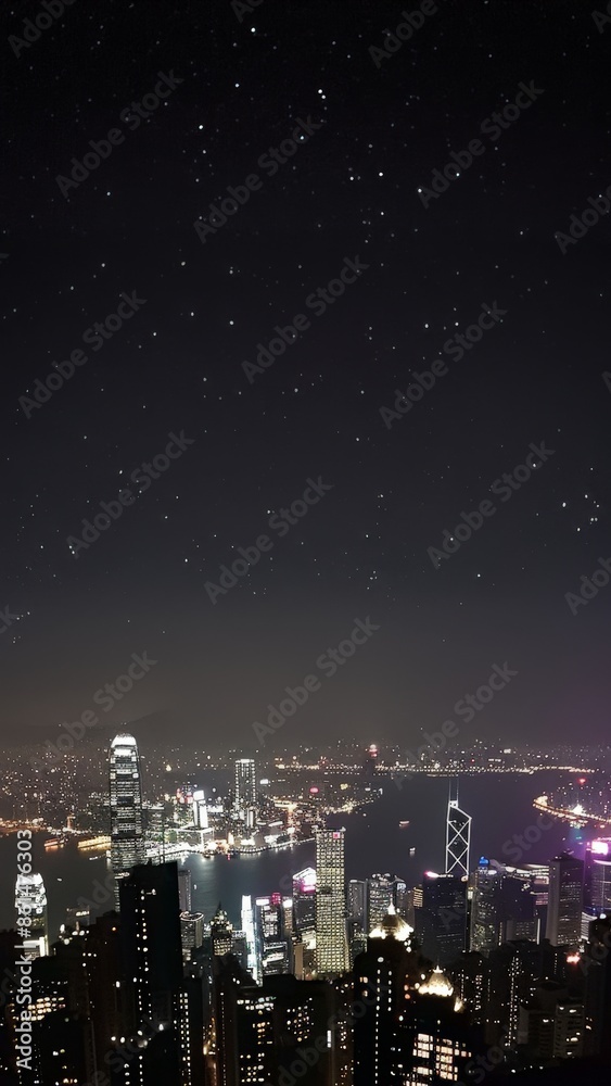 Hong Kong skyline sparkles with city lights and stars at night Hong Kong skyline sparkles with city lights and stars at night