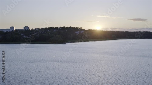 Sunset over a coastal town in Scandinavia photo