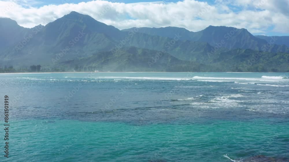 Hawaii nature landscapes. Scenic NaPali coast with beautiful ridges jungle mountains. Scenery of green lavish tropical peaks over turquoise ocean in Hawaiian Hanalei bay Kauai Hawaii nature landscapes. Scenic NaPali coast with beautiful ridges jungle mountains. Scenery of green lavish tropical peaks over turquoise ocean in Hawaiian Hanalei bay Kauai