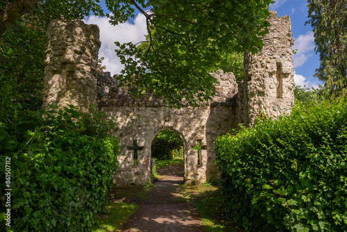Castle Grounds, a public park in Reigate, Surrey, UK. While the castle no longer exists, a mock medieval gateway was built over the ruins in 1777.