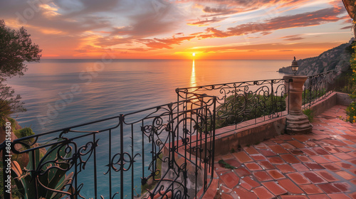 The balustrade is in a Mediterranean style, with terracotta tiles and decorative wrought iron elements. photo