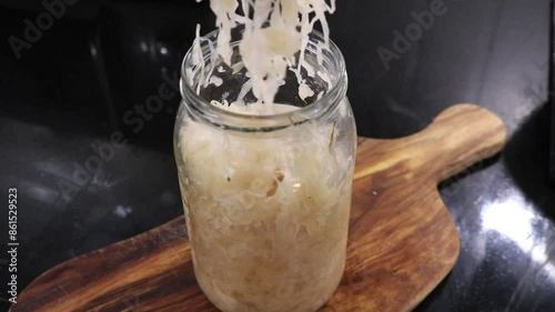 Jar of Sauerkraut German Fermented Food Cabbage Healthy Bacteria Gut Health Fork