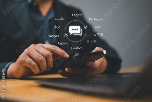 Translator app, language course and e-learning concept. Person use smartphone with Translator app, translation or translate on the mobile app worldwide language conversation speaking concept. photo