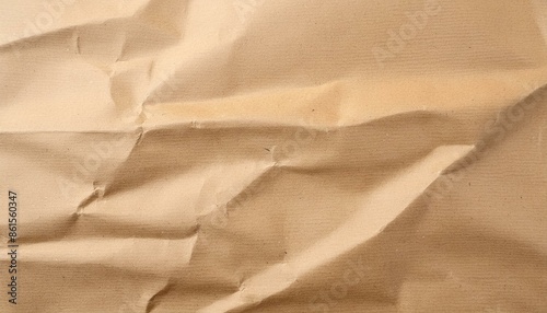 Abstract crumpled and creased recycle brown paper texture background photo