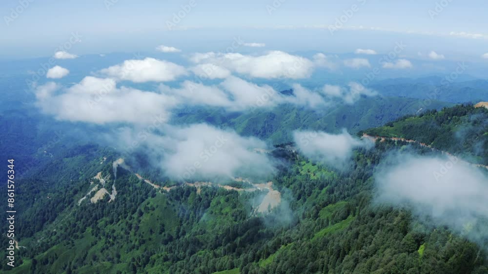 Flight Above Clouds Aerial view of GomisMta, Georgia, scenic mountain. Natural beauty with fog and a serene landscape, perfect for travel.