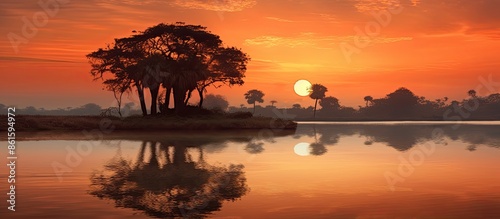 A serene sunrise setting wi...