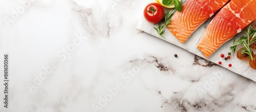 Raw salmon steak on white m...
