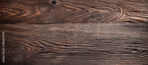 Aged dark wood surface with...