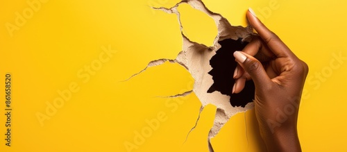 A woman's hand emerges thro...
