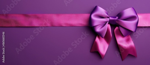 Purple ribbon rolled with a...