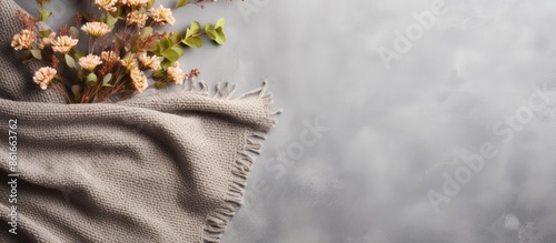 A beige knitted blanket on ...