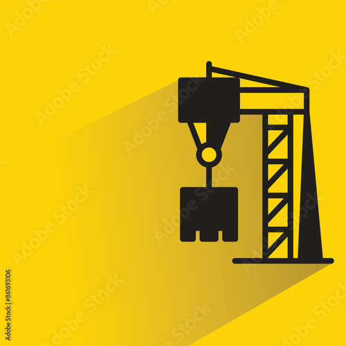 port crane icon with shadow on yellow background