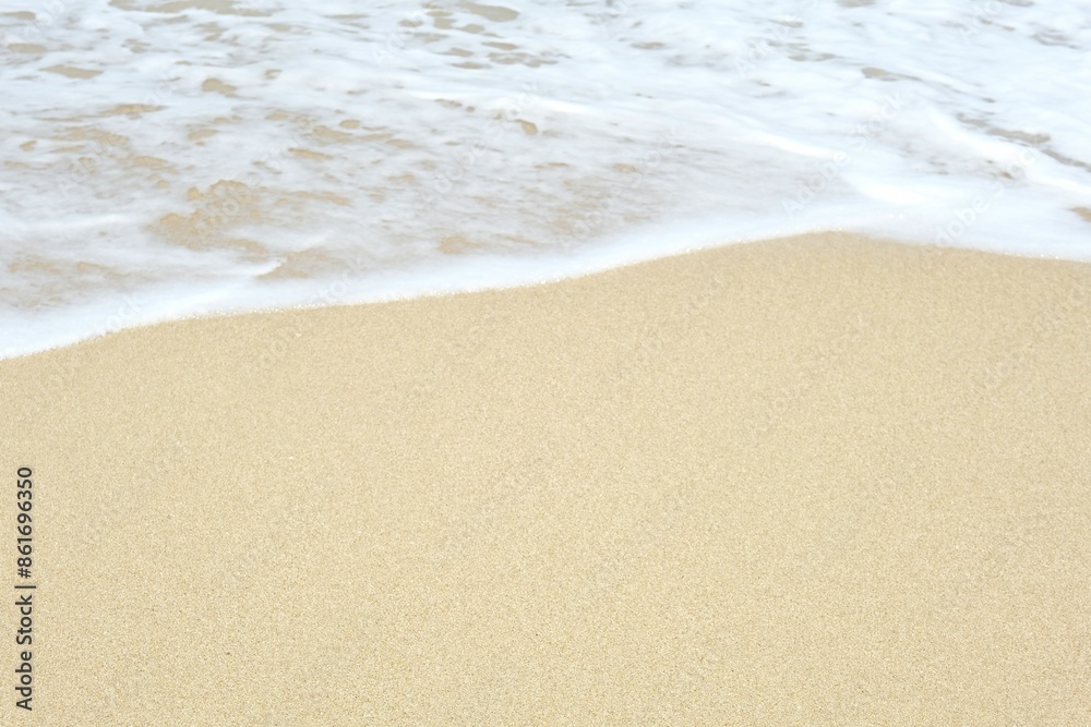 Beautiful view on beach. Sand and wave for nature background. Empty space for text. Pantai Beautiful view on beach. Sand and wave for nature background. Empty space for text. Pantai