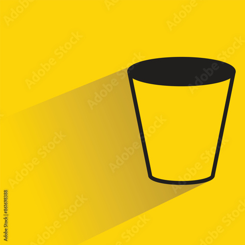 water glass icon with shadow on yellow background