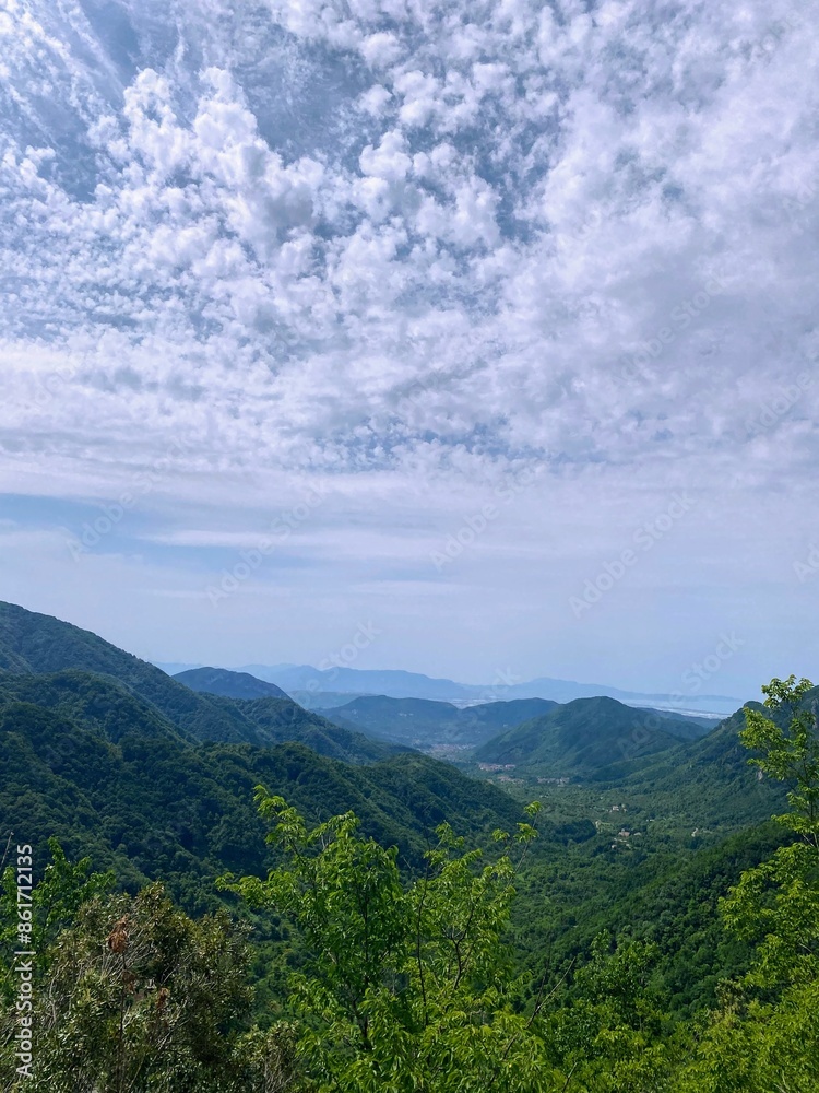 Naklejka premium clouds over the mountains