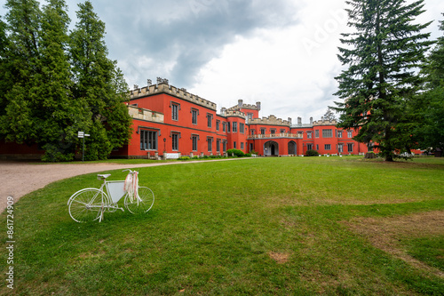 Romantic castle with red facade. Hradek u Nechanic. Czech Republic. Nechanice. Panoramic exterior view. photo