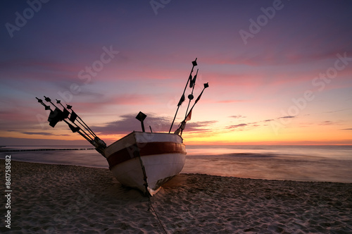 Kuter rybacki, Morze Bałtyckie, zachód słońca, plaża, lato, Rewal, Polska photo