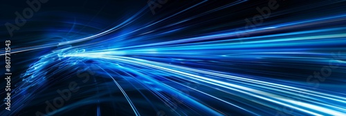 A high-speed motion capture image showcasing vibrant blue light rays streaking across a dark background, creating a sense of speed and energy