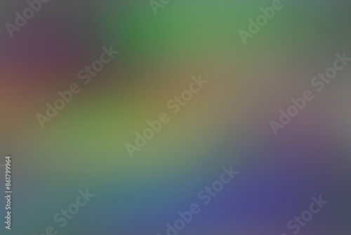 Soft green to purple gradient effect in a blurred image. A seamless blend of green and purple hues forms a calming gradient.