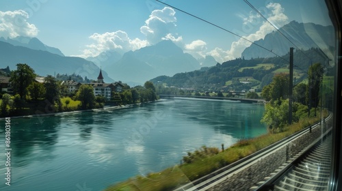 Wallpaper Mural A breathtaking view of the river and mountains from the trains window. Torontodigital.ca