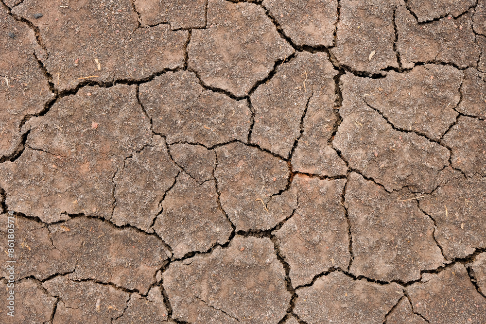 Wall texture soil dry crack pattern of drought lack of water of nature brown old broken background. Wall texture soil dry crack pattern of drought lack of water of nature brown old broken background.